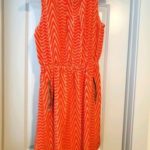 This is a sleevless dress with pockets.